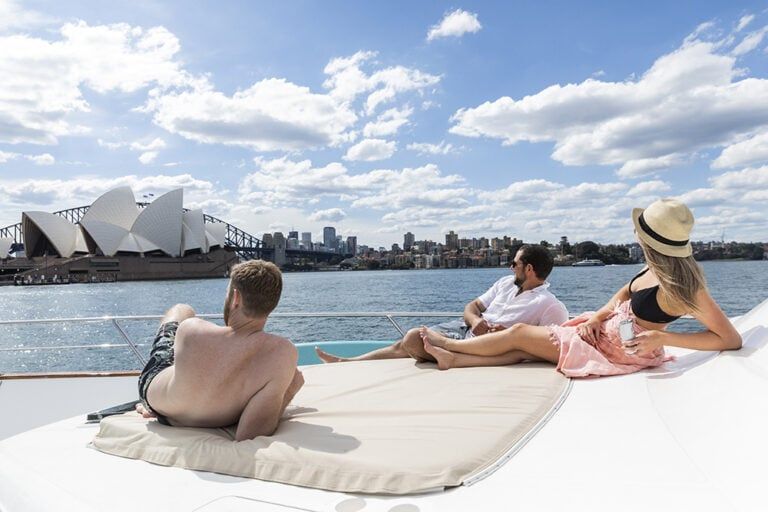 Lifestyle Charters Enigma relaxing on the bow sunbed