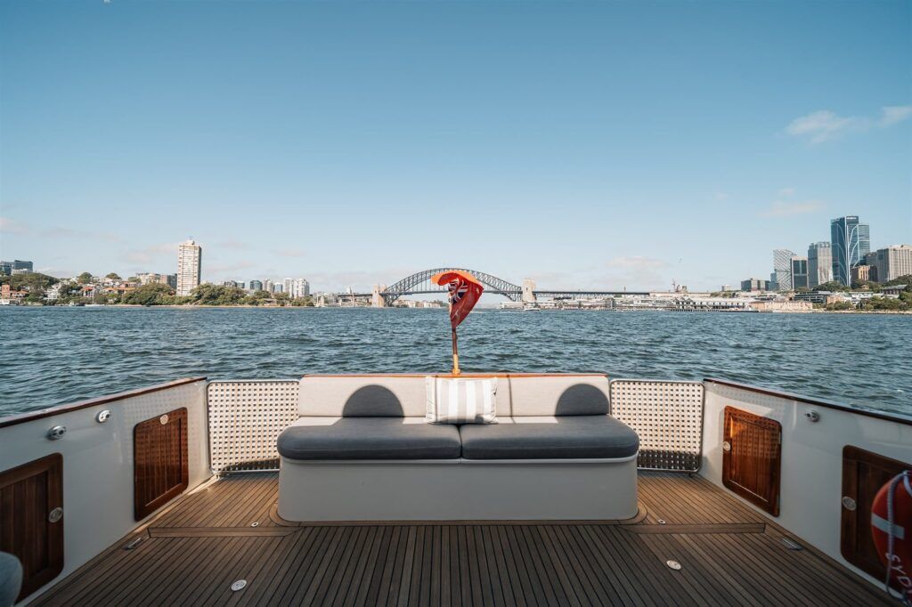 Circular quay harbour lookout: A scenic view of Sydney Harbour from the deck of a boat, featuring the iconic Sydney Harbour