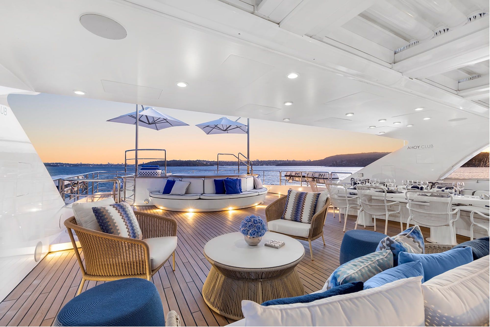 The covered aft deck of superyacht Mischief on Sydney Harbour