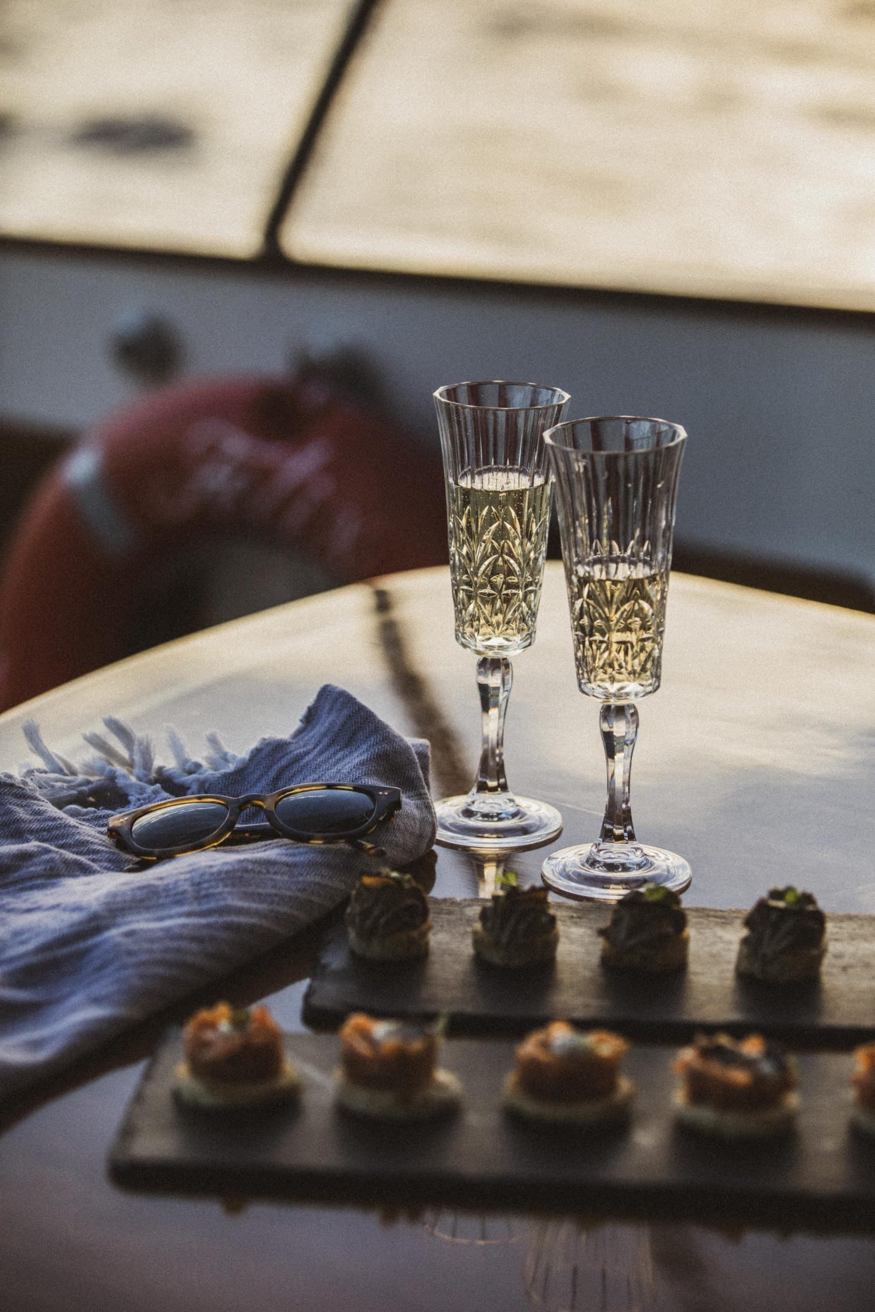 Canapes and champagne on board the motor yacht Felix